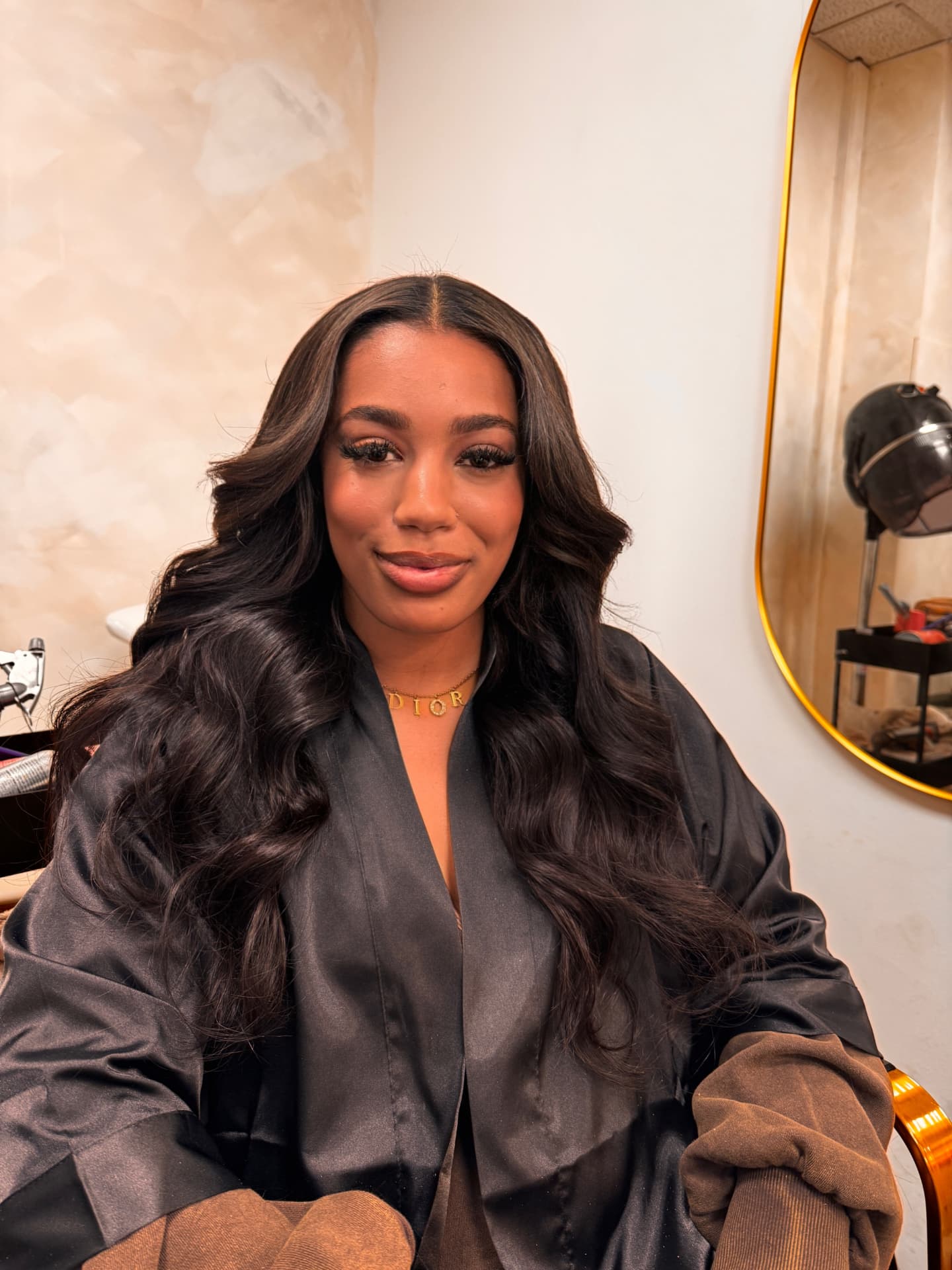 Voluminous hair extension result in salon chair